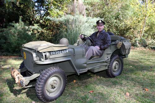 1943 man in willys jeep