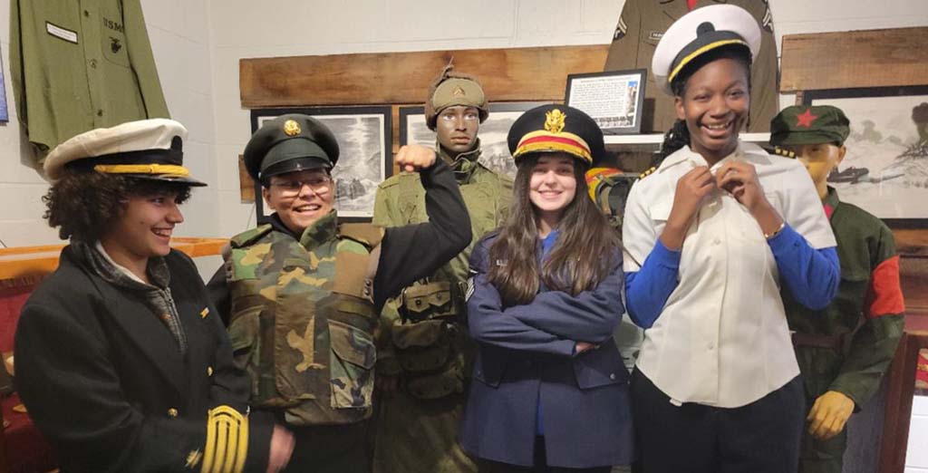 students dressing up in military uniforms